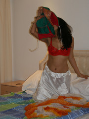 Petite indian pornstar carde hikes up her dress to hump a stiff cock with her willing cunt