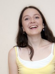 Petit claire is stripping and stuffing a big dildo